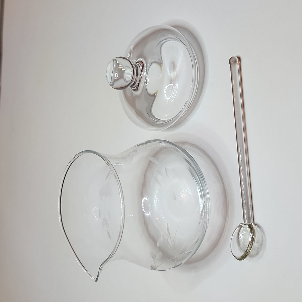 Delicate glass honey pot with spoon, foliage detailing